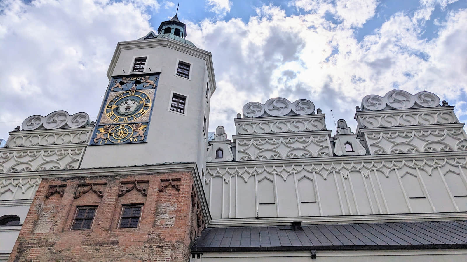 Clock with a mascaron at the Pomeranian Dukes' Castle