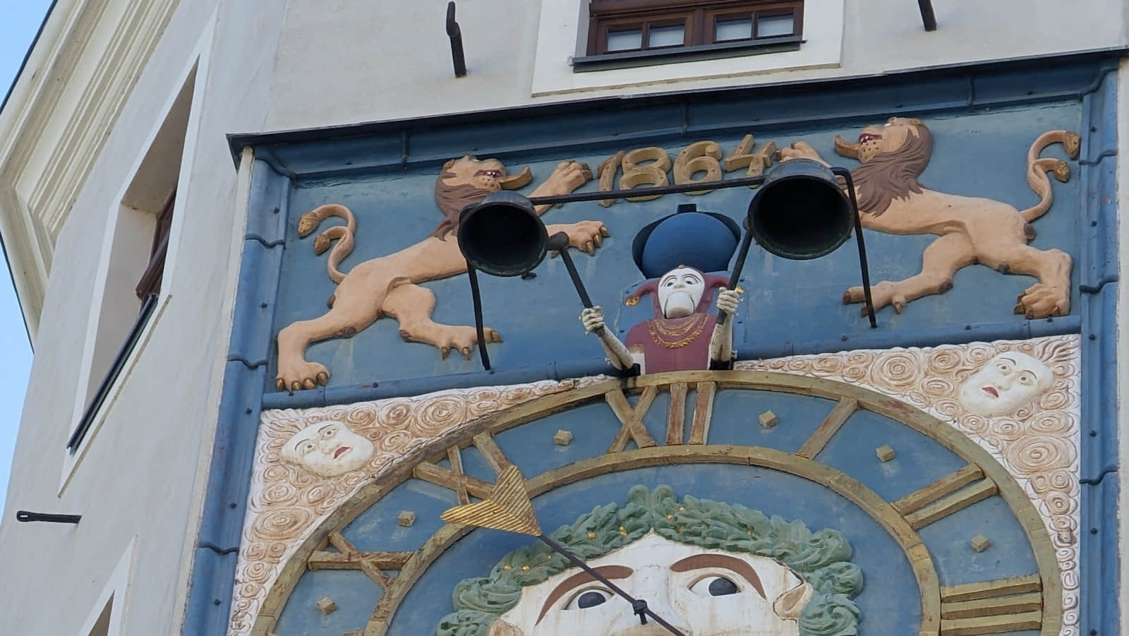 Clock with a mascaron at the Pomeranian Dukes' Castle