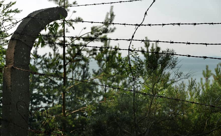 Biała Góra - artillery positions, sea view through barbed wire...