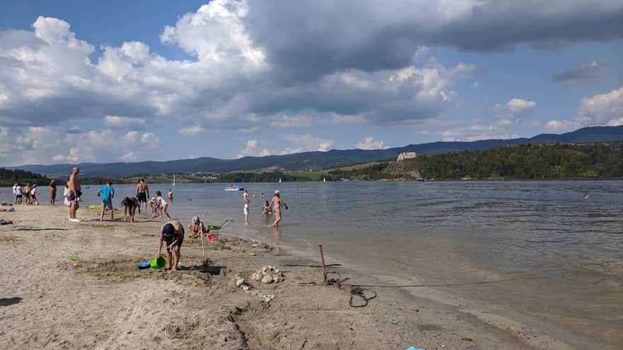 Beach in Niedzica - view of the ruins of Czorsztyn Castle on the other side