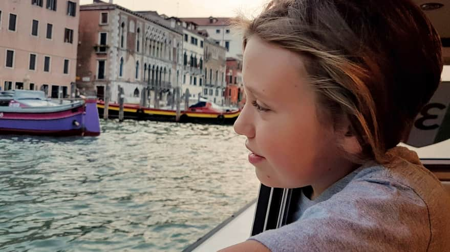 Arriving in Venice by boat through the main canal - Canal Grande.