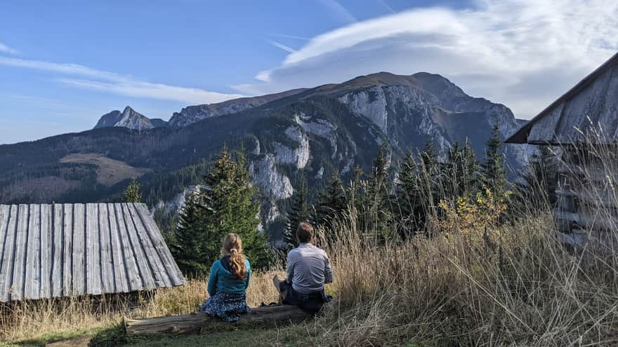 Resting on Polana Stoły - the pointed peak on the left is the summit of Giewont